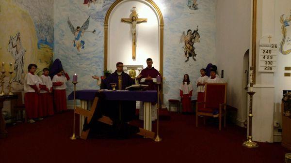 Bishop Rojas and Fr Stipe celebrating mass at St Lucy's