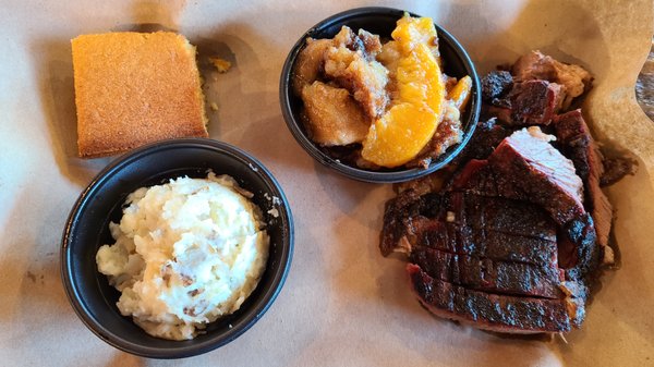 Brisket, Smashed Potatoes, and Peach Cobbler.