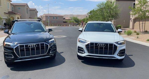 Two of the same car different color finished product with wax