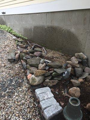 AFTER: Flat topper stones in path and in empty space behind wall. And knocked through.