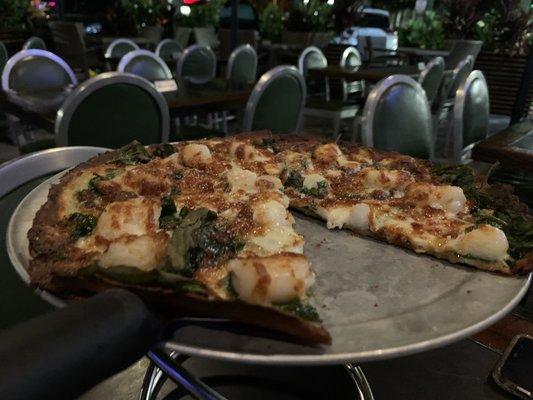 Shrimp & spinach pizza on thin cauliflower crust.