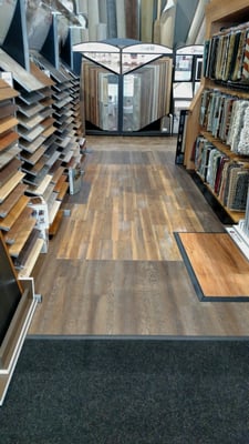 Surya Area Rugs, Shaw Luxury Vinyl Tile & Planks.