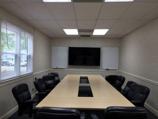 10-14 Person Conference/Training Room with 75" monitor.