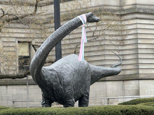 Dippy the dinosaur wearing a scarf