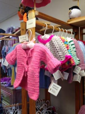 Hand knitted items for children.