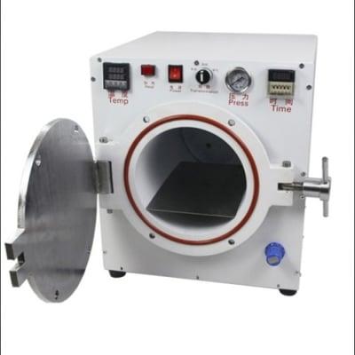 This is an autoclave and is used to remove air bubbles between glass and LCD.