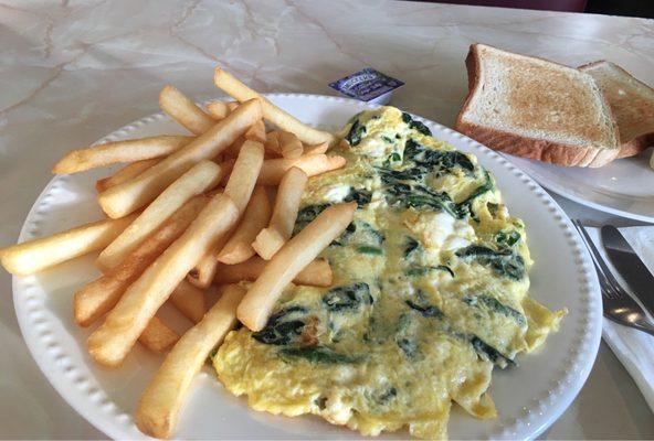 Feta cheese &spinach omelette, fries and white toast