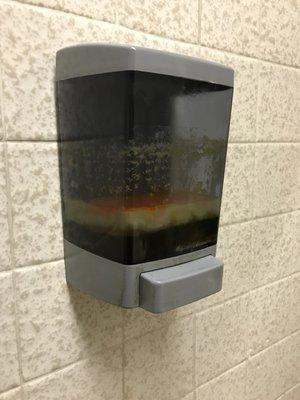 Disgusting. Soap Dispenser in women's restroom.