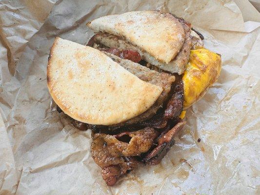 Sausage, egg, cheese, bacon breakfast sandwich