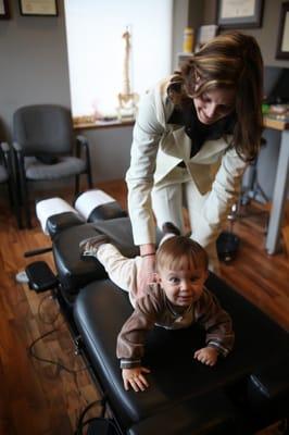 Dr. Tessa adjusting some of the pediatric patients in the office.