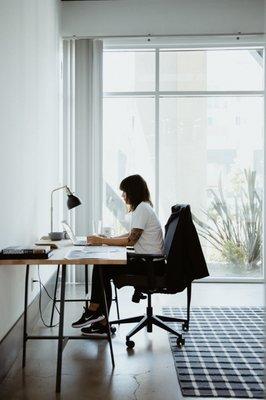 Natural light floods into private offices.