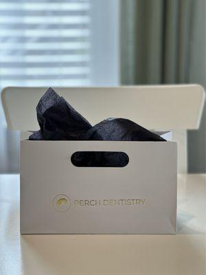 From the gold foil logo to the elegant color contrast of the crisp white on black tissue paper, Perch creates memorable experiences.