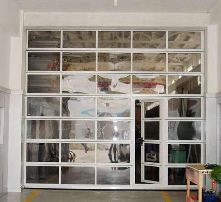 commercial aluminum garage door with entry door