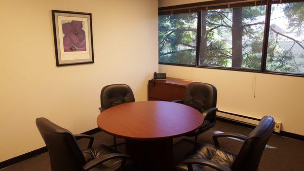 Our small conference room perfect for document executions and interviews seating 1-4 people.