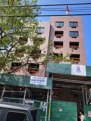 A&E is installing windows at the new building in the Bronx