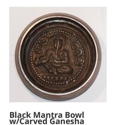 Black mantra bowl with Ganesha carving.