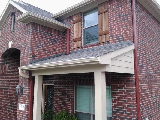 Seamless Aluminum Rain Gutter & downspouts in front and back of home. 100% Customer Satisfaction! Spring, Katy, Tomball