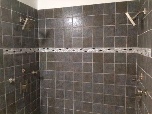 Bathroom remodel and dual head shower done by Greer Water Works.