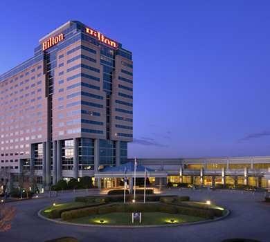 We are located in the lower lobby of the Atlanta Airport Hilton Hotel; shuttle bus runs to the airport every 15-20 mins.