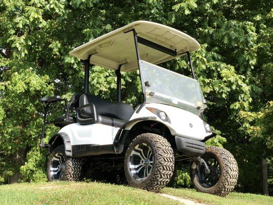 White Yamaha Drive with Jake's Lift Kit, Custom Wheels and Rear Flip Seat