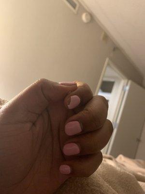 Chipped SNS dip nails.