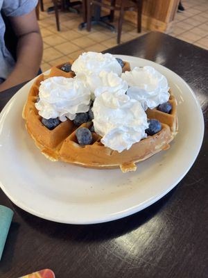 Belgian waffle with fruit.