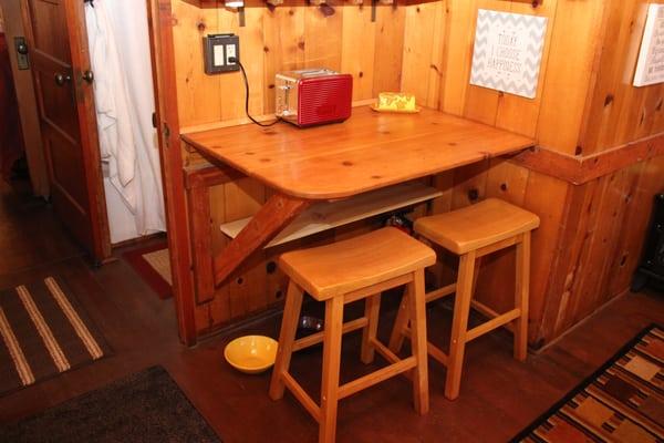 Versatile kitchen table...perfect for 2, or doubles as counter space.