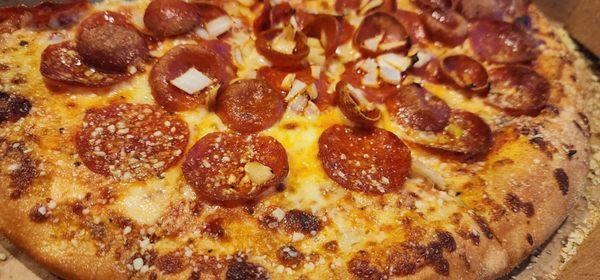 Pepperoni and onion pizza