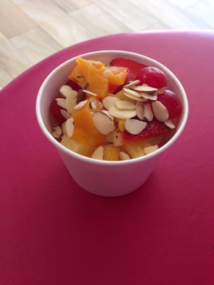 Yellow Cake Batter and Graham Cracker frozen yogurt with fruit and almond toppings, YUM!!!