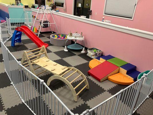 We also have a separate gated area for kids age 2years and under. Soft play climbing set, swing, ball pit, slide and a jumperoo.