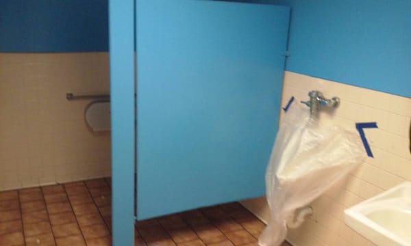 Men's bathroom with no stall door, no urinal, door doesn't lock