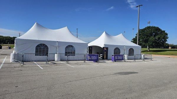 20x30  High Peak Marquee Tents, with Cathedral Side Walls and crowd control Barricade.