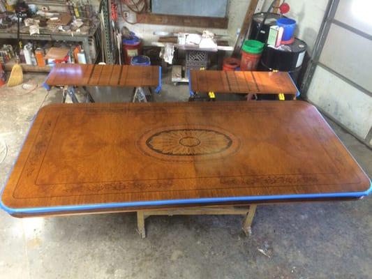 Original dining table brought in to be refinished has some hazy finish issues. Ready to start the stripping process.