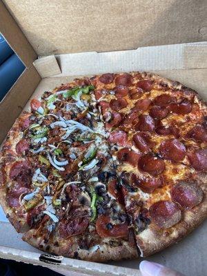 Half pepperoni half combo large pizza.