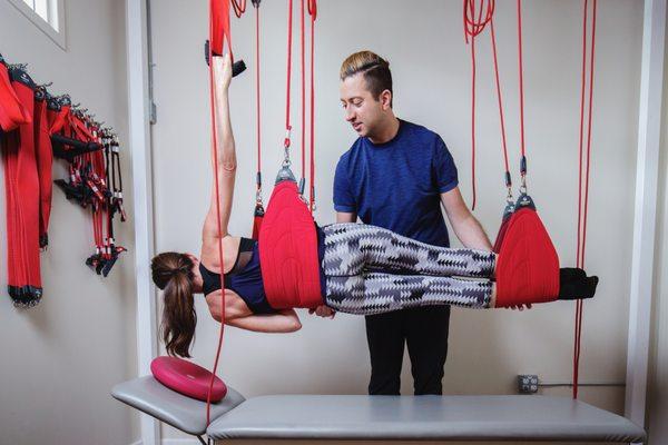 Redcord multi-suspension exercises are challenging yet safe with supporting bungees and slings. They're also really fun.