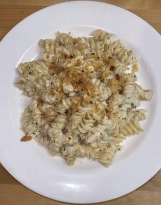 Truffle mac cheese topped with homemade garlic brioche bread crumbs!