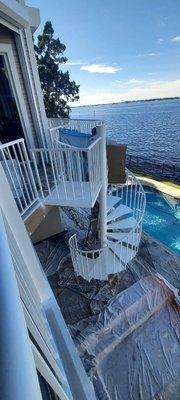 Spiral staircase was painted to match railings.