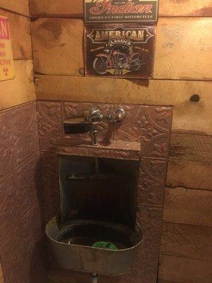 Super funny urinal made out of interesting items.