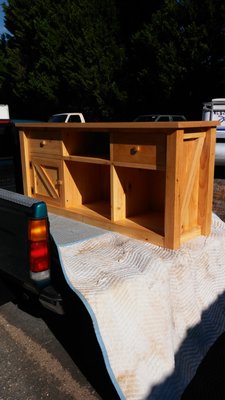 custom built entertainment center with barn door sides