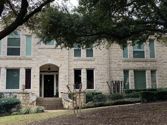 Custom white casement windows and arch windows with Low E glass.