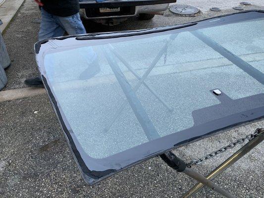 No urethane on glass allowing glass to come inside of car and damage carpet and electronics