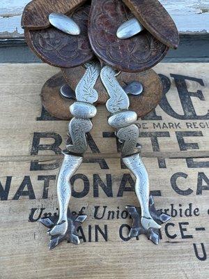 Hand made cowboy spurs and other artifacts.