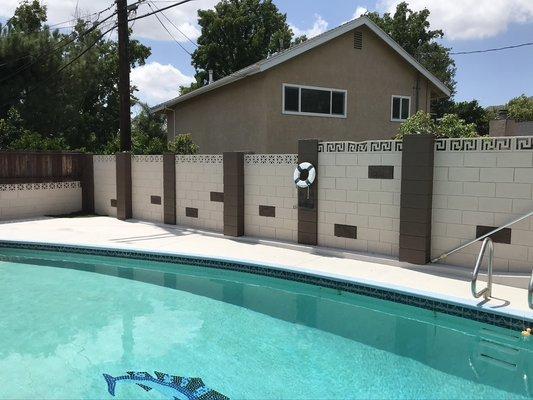 Wall painted and pool deck painted and sealed