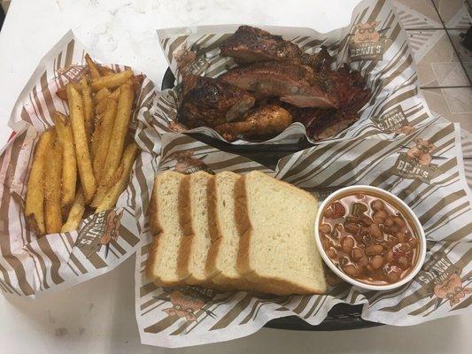 3 meat combo. Ribs, brisket and chicken with charro beans and fries