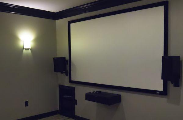 The 110" screen, Klipsch front surround speakers, and Sony AV Receiver