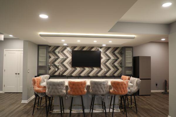 Beautiful custom basement kitchen and dining area.