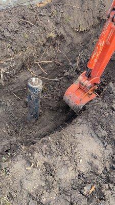 Digging up broken pipe, underground near outside, sewer clean out located in Wichita Kansas