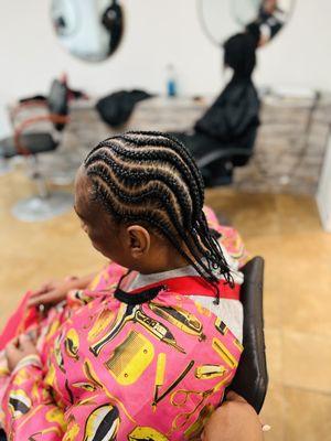 Conrows braids with extensions.