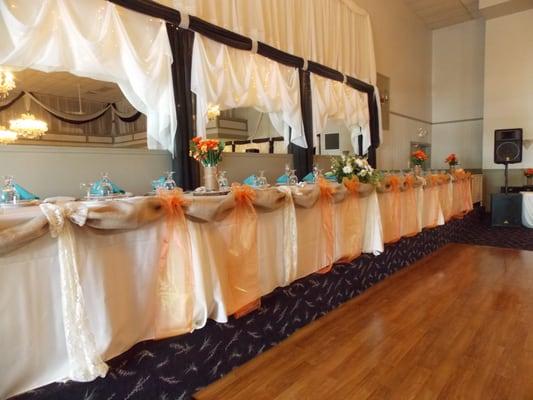 A little country with burlap and beautiful orange bows.