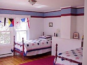 Stork's Nest, "kids' room" with 3 twin beds.